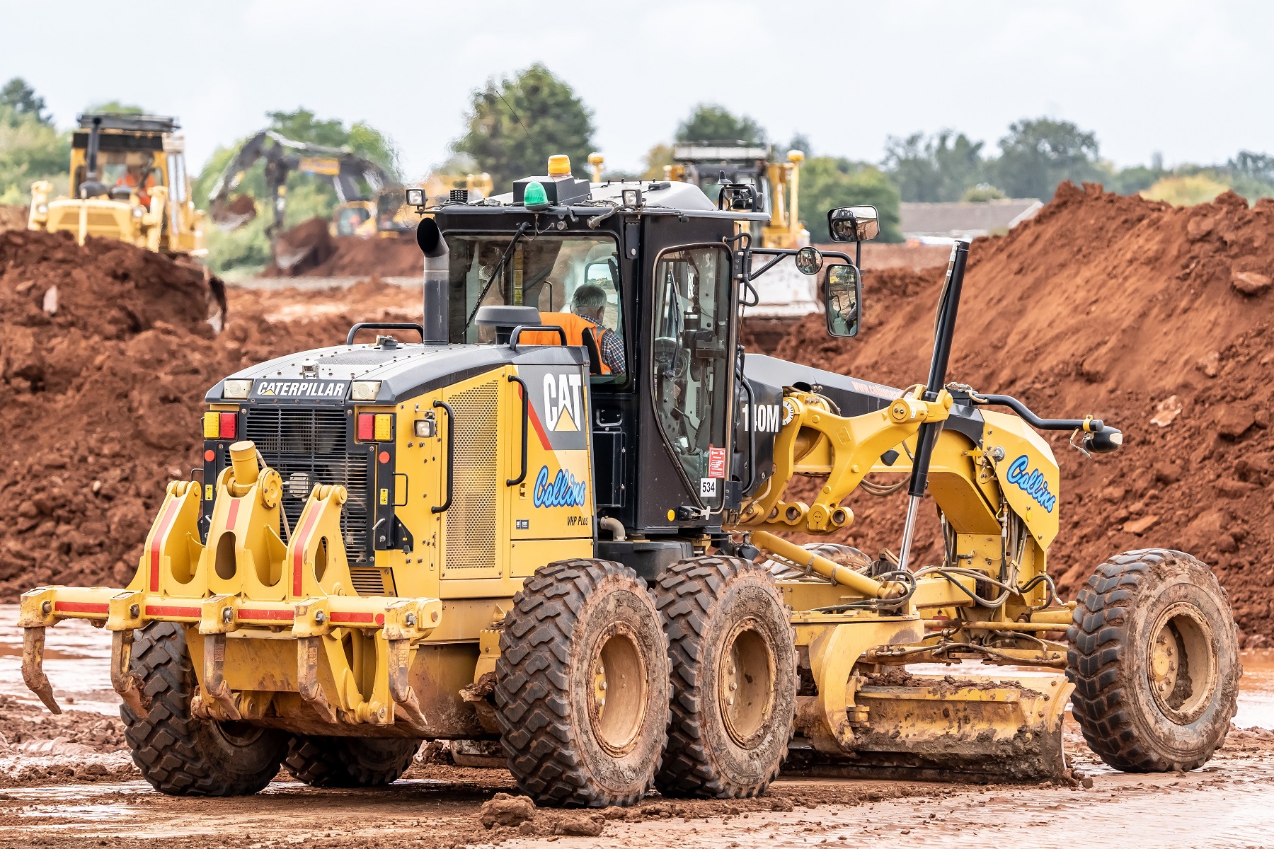 Collins Earthworks' new Cat 160m graders are vital in keeping haul routes in good condition